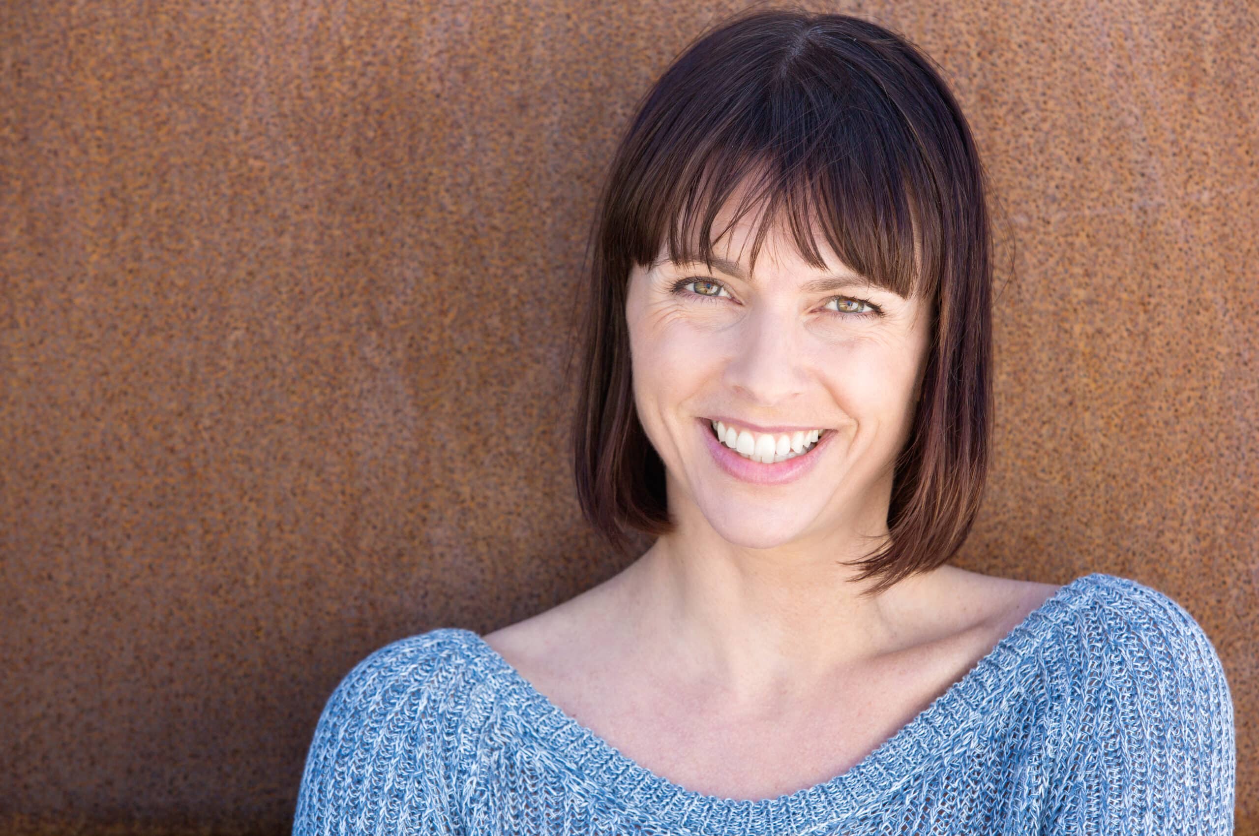 Close up portrait of a happy middle aged woman